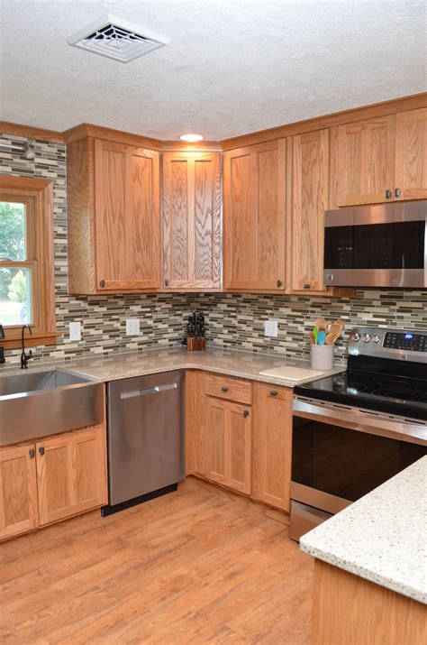 stainless steel cabinets with honey oak cqbinets|honey oak cabinet backsplash.